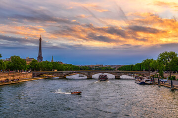 Sunset view of Eiffel tower and Seine river in Paris, France. Eiffel Tower is one of the most iconic landmarks of Paris. Cityscape of Paris - 764828832