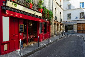 Cozy street with tables of cafe  in Paris, France. Cityscape of Paris. Architecture and landmarks of Paris - 764831469