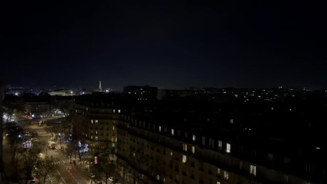 Nocturnal Glow of Paris: City Lights Illuminating the Night Sky