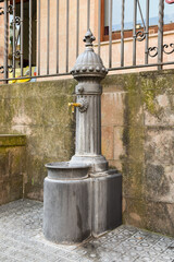 old metal fountain in the park in the city of Solsona catalonia spain