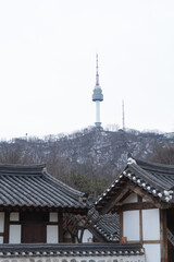 Seoul Tower, South Korea in urban city in Asia. Skyscraper and high-rise buildings.