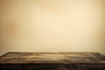 Wooden surface with spotlight and soft beige background. High quality photo