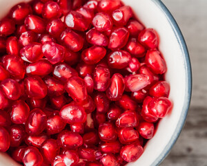 Close up of Juicy Organic Pomegranate Seeds in a Bowl
