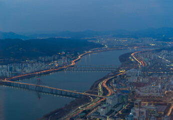 Aerial view of Seoul Downtown Skyline, South Korea. Financial district and business centers in smart urban city in Asia. Skyscraper and high-rise buildings.