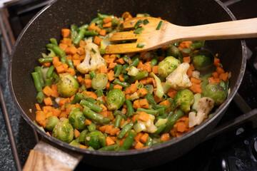 Fried vegetables in frying pan ready to eatFried vegetables in frying pan ready to eat