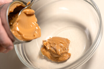 Add sweetened condensed milk caramel from tin can into glass bowl. Cooking Salted Caramel Chocolate Cold Cake Series.