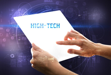 Hand holdig futuristic tablet , technology concept