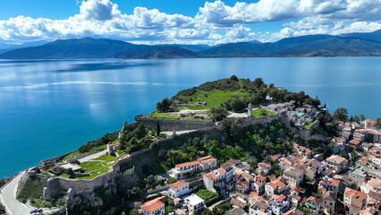 Aerial drone photo of iconic Acronafplia fortress overlooking old city of Nafplio below famous...