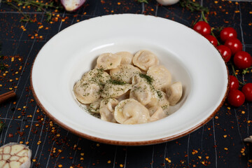 Dumplings stuffed with meat, ravioli, dumplings. Dumplings with stuffing. Russian cuisine. Copy space