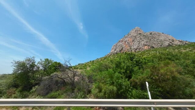 Rock muntain landscape view in Spain along the highway, view from the car window