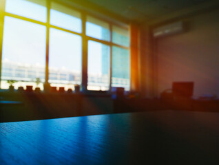 Light coming from symmetric windows in morning office