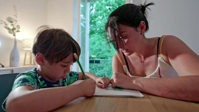 Mom Helps Little Boy Write And Practice The Letter A - Homeschooling Literacy Process