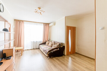 standard interior apartment. living room with sofa