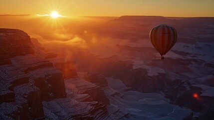 Hot balloon flying in air in Grand Canyon.