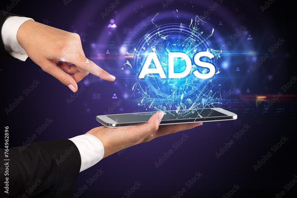 Poster close-up of a touchscreen with abbreviation.