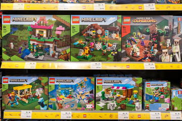Fototapeta premium LEGO Minecraft sets on store shelves. Lego construction kits for sale at Lego Store. Minsk, Belarus - March 22, 2024