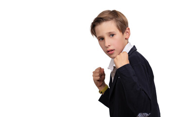 Obraz premium Portrait of a boy who is defending himself, ready to fight on a white background.