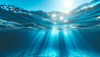 Fototapeten Sunlit underwater view with sparkling water surface. Deep sea ambiance concept. Generative AI © Who is Danny