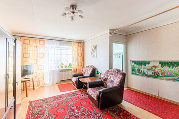 standard interior apartment. living room with sofa