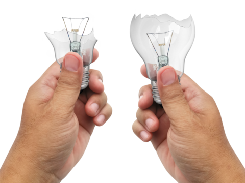 The broken bulb in a hand, transparent background