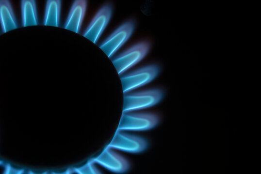 General stock - Gas flames on a cooker in the dark