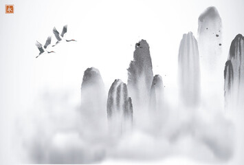 Ink painting of cranes flying over high mountains. Traditional oriental ink painting sumi-e, u-sin, go-hua. Translation of hieroglyph - eternity