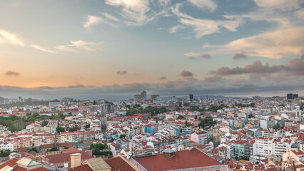 Fototapeta premium Panorama showing Lisbon famous aerial view from Miradouro da Senhora do Monte tourist viewpoint timelapse