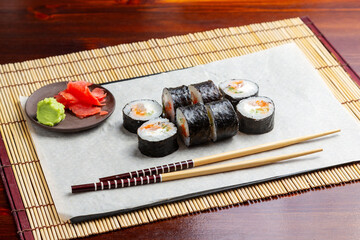 Sushi, maki rolls with shrimp, cucumber and cheese. Lunch. Japanese food.