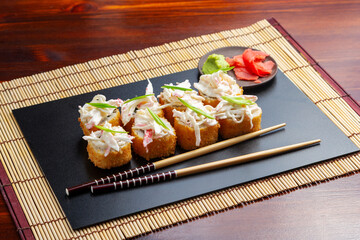 Sushi, fried tempura rolls with crab meat. Lunch. Japanese food.