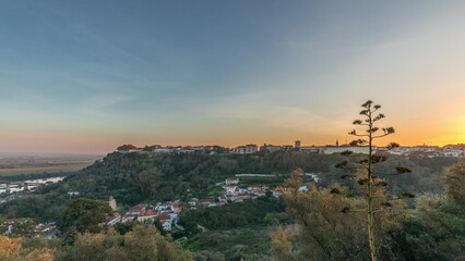 Panorama showing sunset over the Castle of Almourol on hill in Santarem aerial timelapse. Portugal