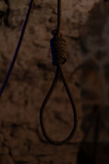 Rope with a noose in the torture chamber.