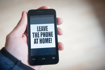 Concept - Mobile telephone addiction - Leave the phone at home!