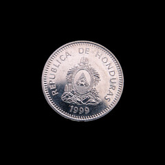 Honduras coin on a black background.