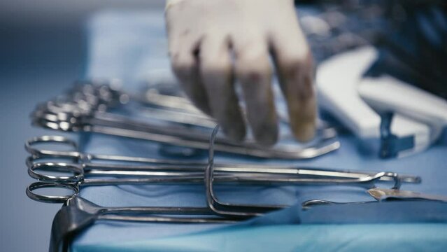 Surgical instruments. Several surgical instruments on the table in the operating room. Modern medical concept, surgery and modern medical technologies.