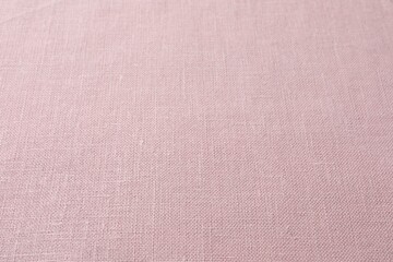 Texture of pink fabric as background, closeup