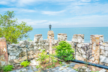 View of the Sea and the lamp on the pole,Summer blue beach and travel vacation.
