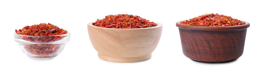 Aromatic spices. Red chili pepper flakes in bowls on white background, set