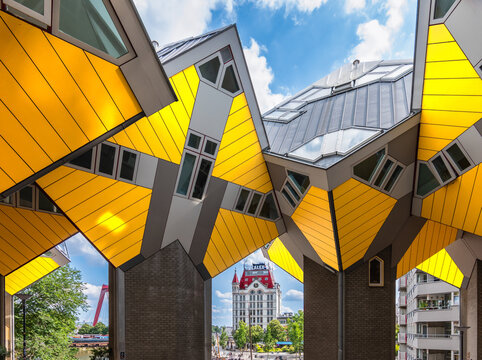 Rotterdam, the Netherlands - July 18, 2023: Yellow cube houses in Rotterdam at the Old Harbor.
