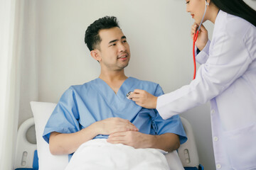 Fototapeta premium A man is being checked by a doctor