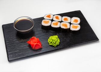 Sushi, shaki maki rolls with salmon. Lunch. Japanese food.