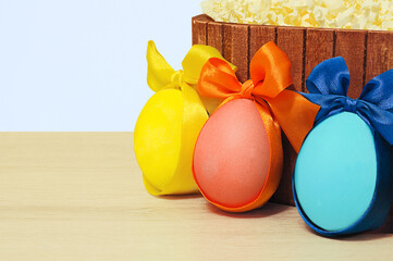 Easter eggs on the background of a wooden box