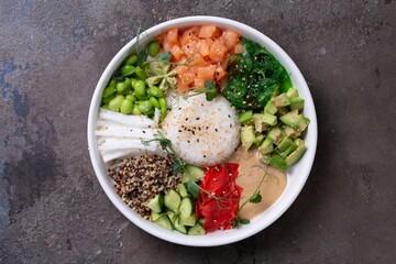 Top view of fresh ingredients for healthy eating on white plate