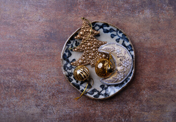 Christmas decoration on rustic stone background. Soft focus. Top view. Copy space.