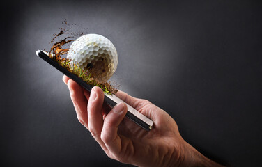Concept watching golf online with hand with mobile and ball