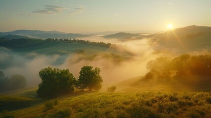 Misty hills at sunrise capture the ethereal beauty and soft light.