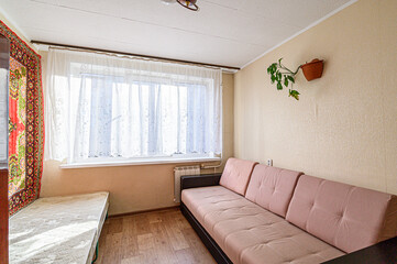 standard interior apartment. living room with sofa