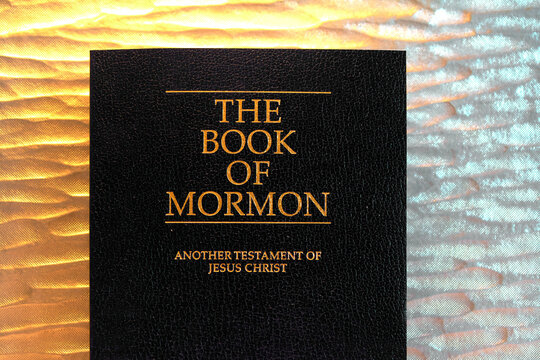 The &lsquo;Book of Mormon&rsquo; shines with golden letters, inviting readers to explore its pages offering an additional testament of Jesus Christ.