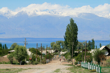 Village at the shores of Issyk-Kul and Tian Shan Mountains, Kyrgyzstan