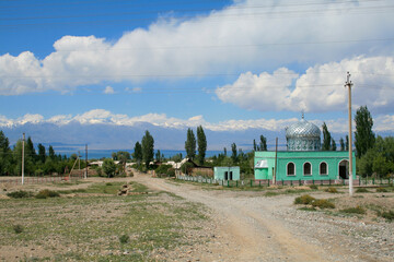 Village at the shores of Issyk-Kul and Tian Shan Mountains, Kyrgyzstan