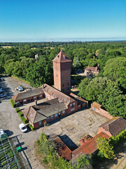 Exbury Gardens in New Forest, Hampshire. Closeup aerial view of Exbury water tower with clock....